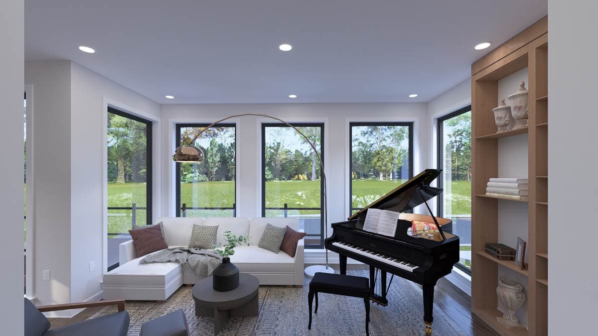 Living room with white sectional sofa, grand piano, floor-to-ceiling windows, and built-in shelving.