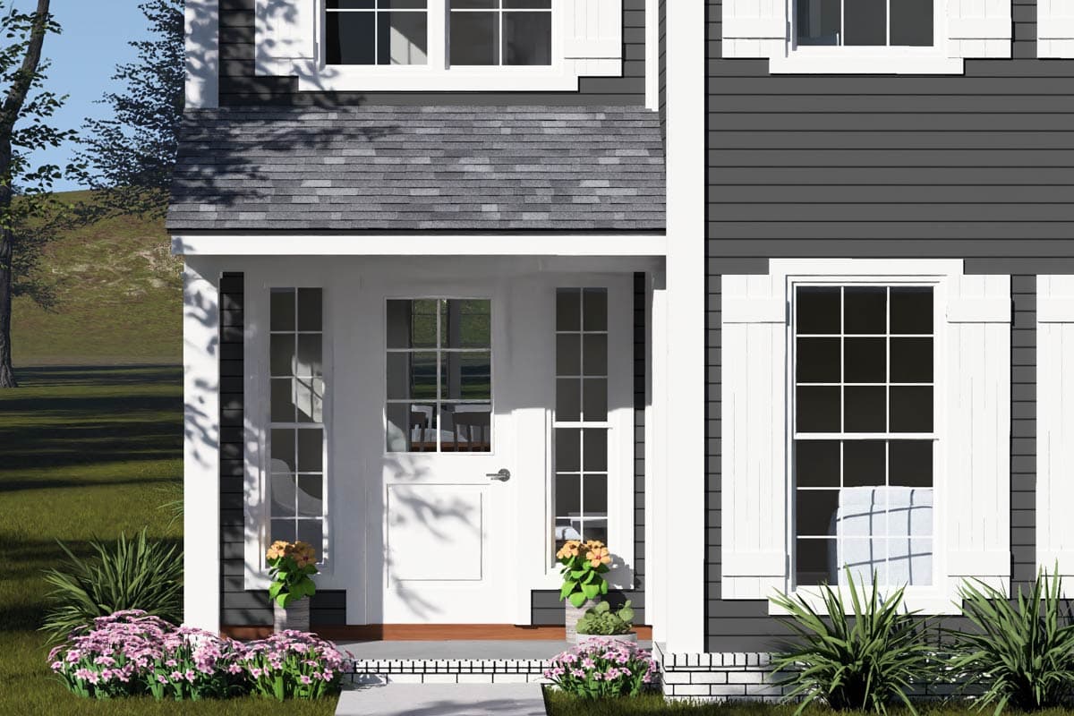 House plan exterior: Two-story home with a covered entry, multi-pane windows, and dark horizontal siding.