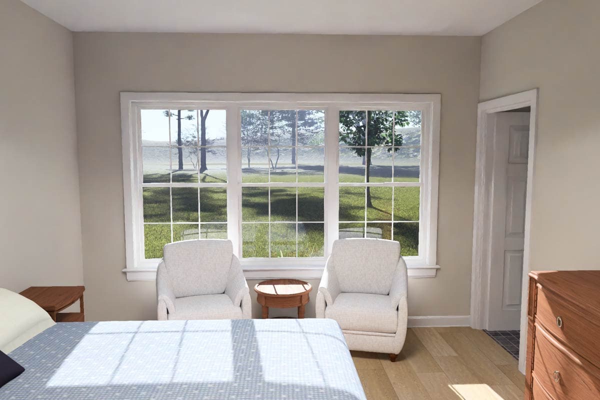 Bedroom interior with large grid-pane windows, two armchairs, and a doorway to an adjacent room.