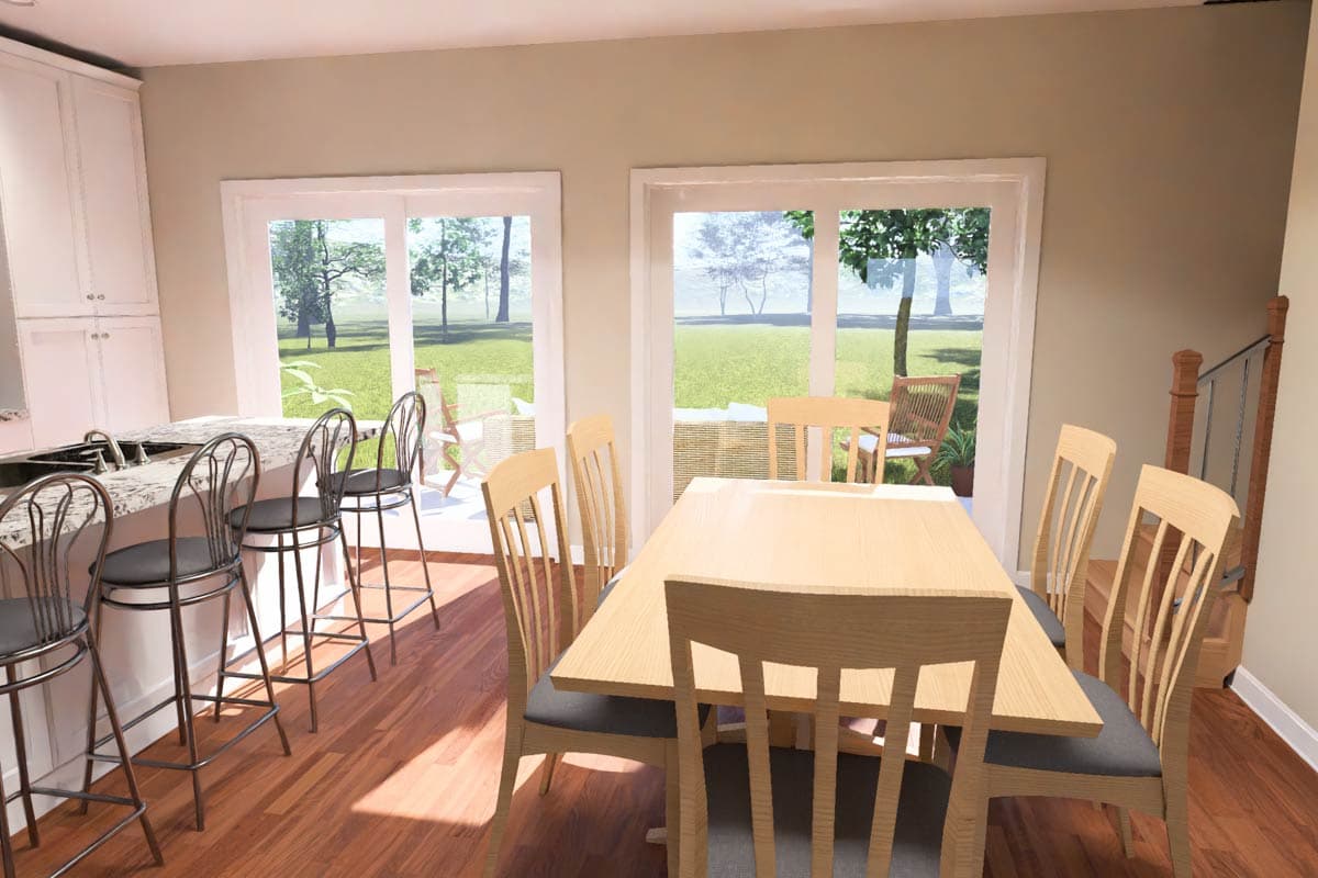 Interior view of a dining area and kitchen with counter stools, a dining table and chairs, and sliding glass doors leading outside.