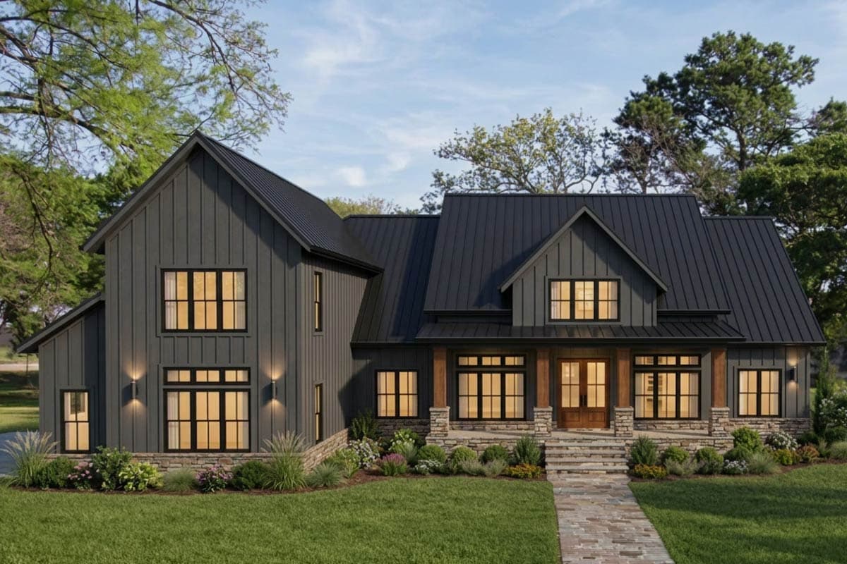 Modern Farmhouse house plan exterior with dark vertical siding, metal roof, stone accents, covered entry, and multiple gables.