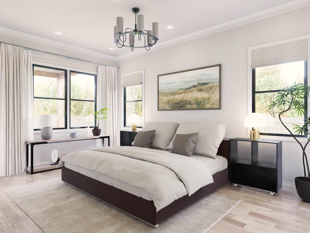 Primary bedroom with large windows, king bed, artwork, and minimalist console table.