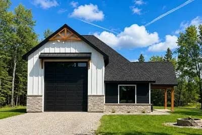 Charming Farmhouse Garage Plan Featuring a Spacious RV Garage