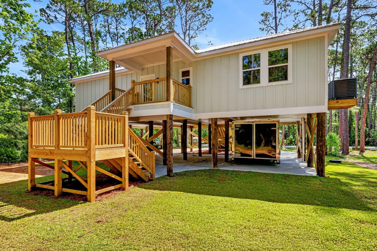 Plan 461052DNN: Coastal Beach House Plan with Three Bedrooms and Drive Under Garage - Image #3 - Beach, Coastal, Florida-Style, Low Country, Vacation