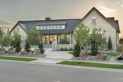European Mountain Ranch House Plan with Expansive Three Car Garage