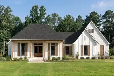 Farmhouse House Plan with Three Bedrooms and Side Entry Garage