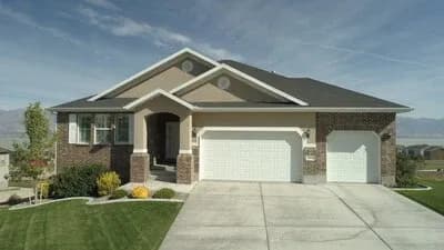 Craftsman Style House Plan with Two Bedrooms and Three Car Garage