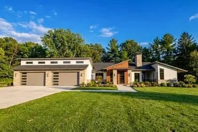 Contemporary Dogtrot House Plan with Three Bedrooms and Expansive Outdoor Living
