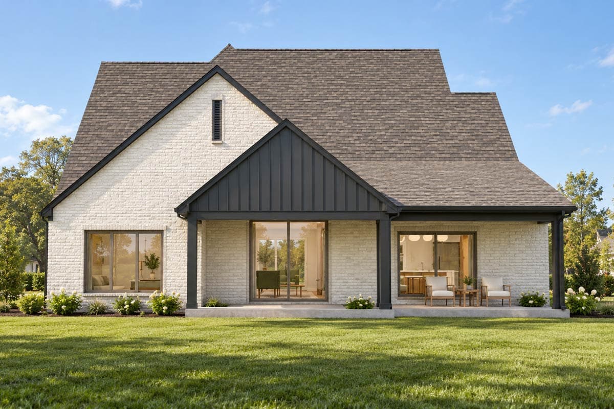 House plan exterior: Modern Farmhouse style, two stories, white brick, gabled dormer, covered porch with dark metal roof.