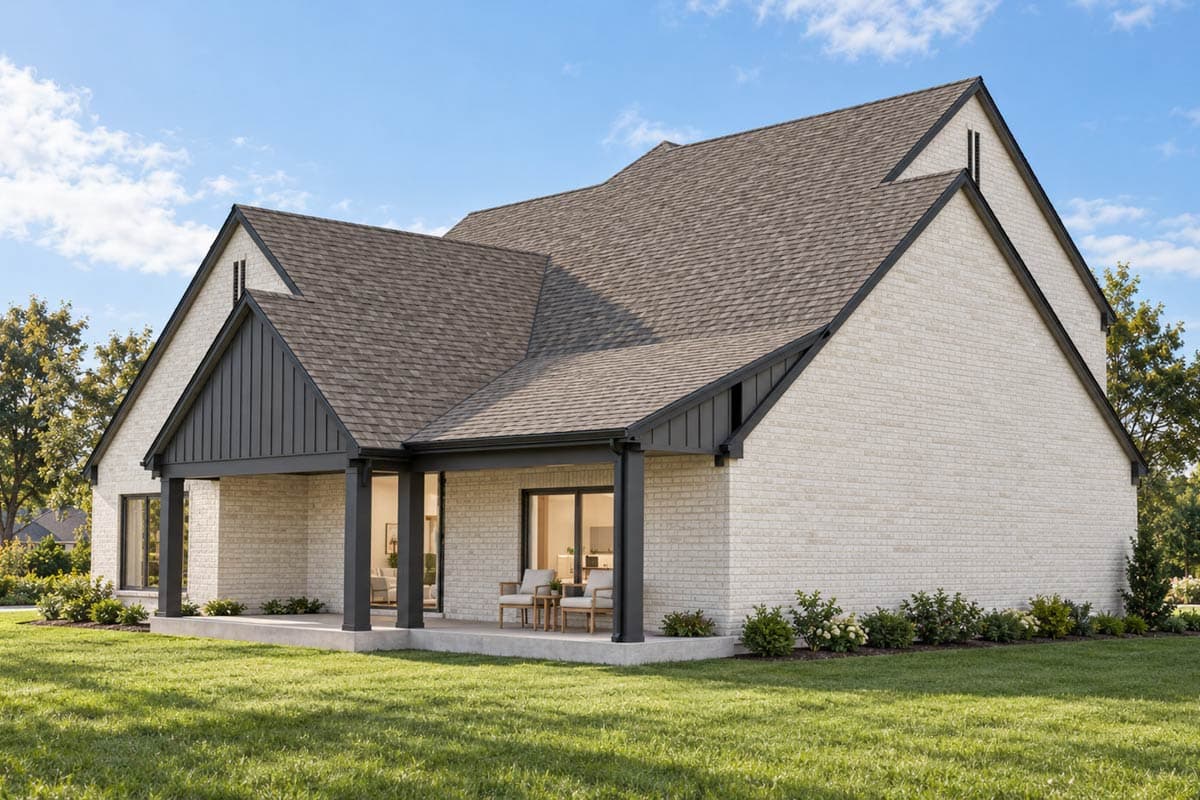House plan exterior with white brick, dark gables, gable vents, and a covered porch with square columns.