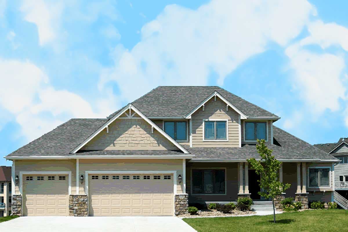 House plan exterior: Two-story home with a prominent gable, stone accents, and a three-car garage.