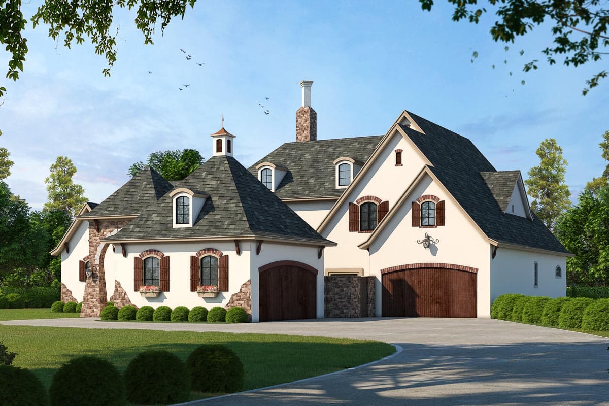 House plan exterior: Two-story French Country style with dormers, arched windows, stone accents, and a cupola-topped gable.