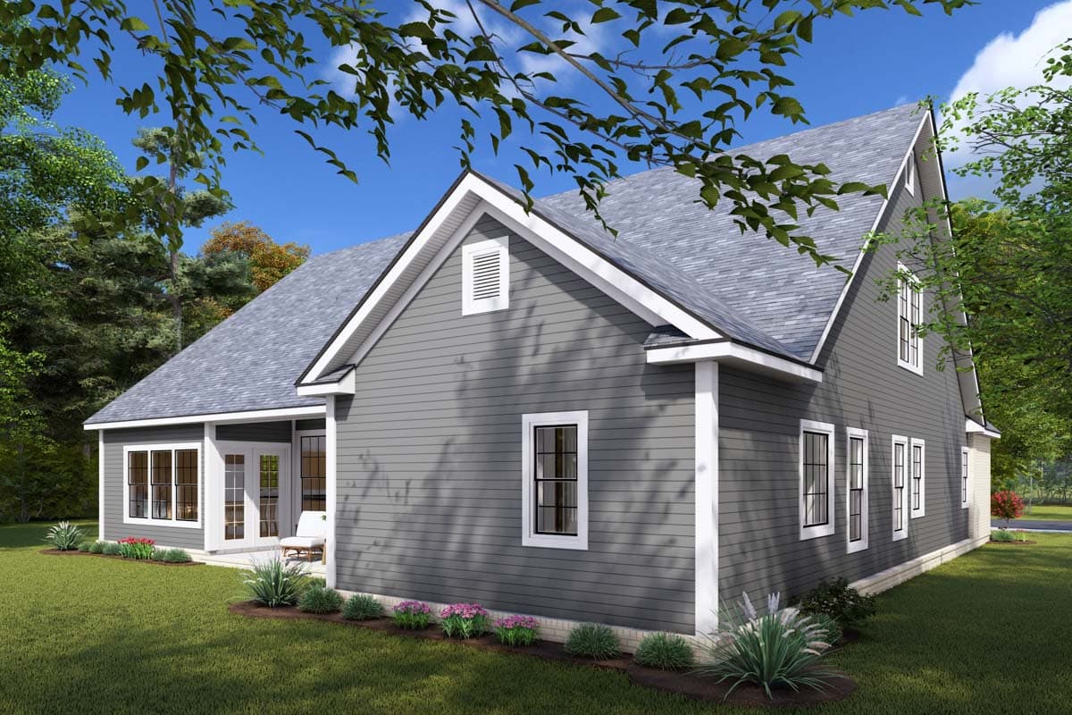 House plan exterior: a two-story Modern Farmhouse with gables, dormers, and a covered patio.