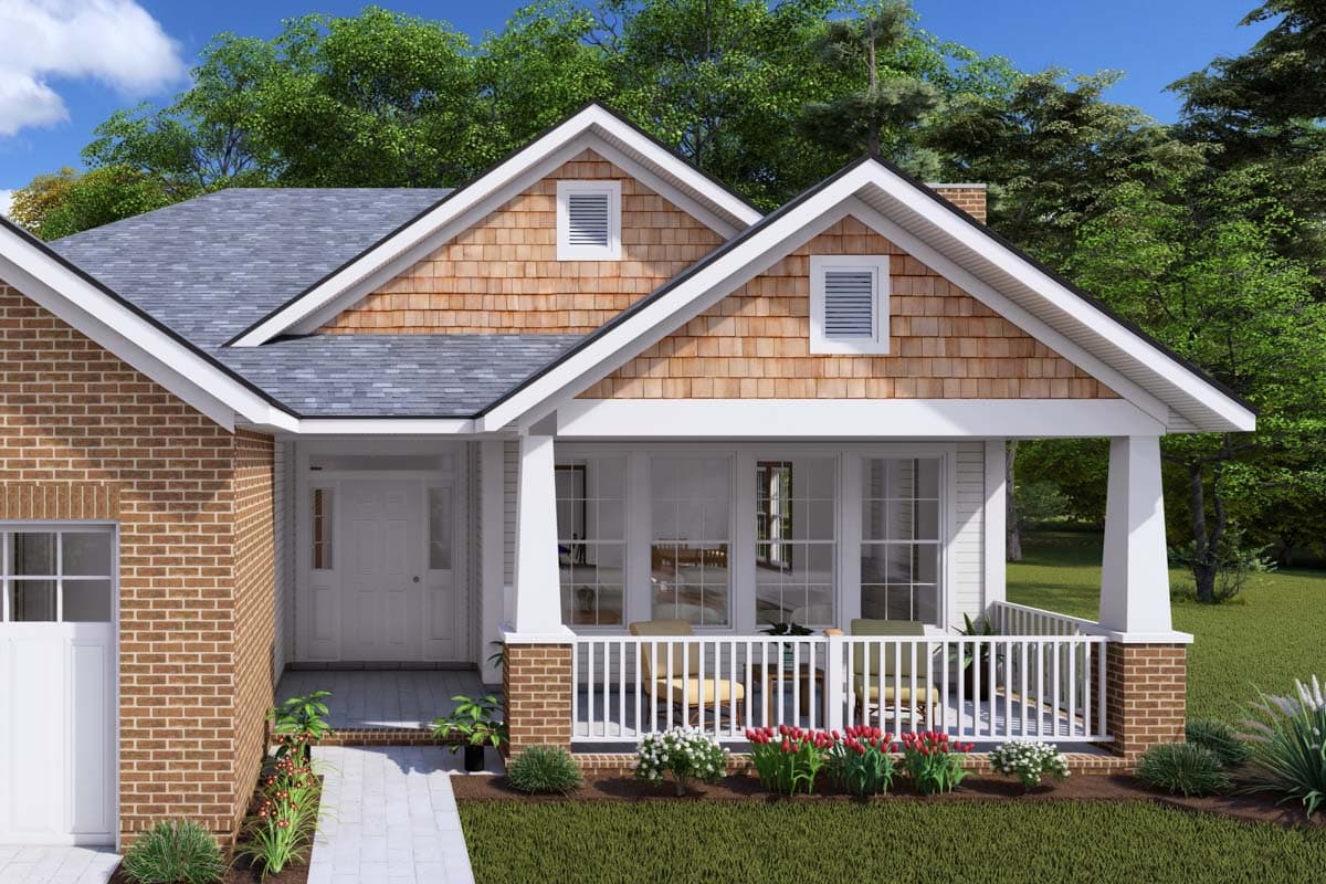 House plan exterior featuring brick and cedar shake siding, a covered front porch with white railings, and multiple gables.