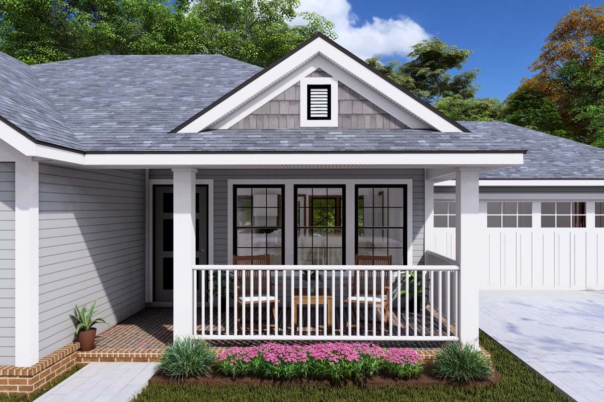 House plan exterior: Ranch style, 1 story, featuring a covered front porch with white railings, a gable dormer with louvers, and an attached garage.