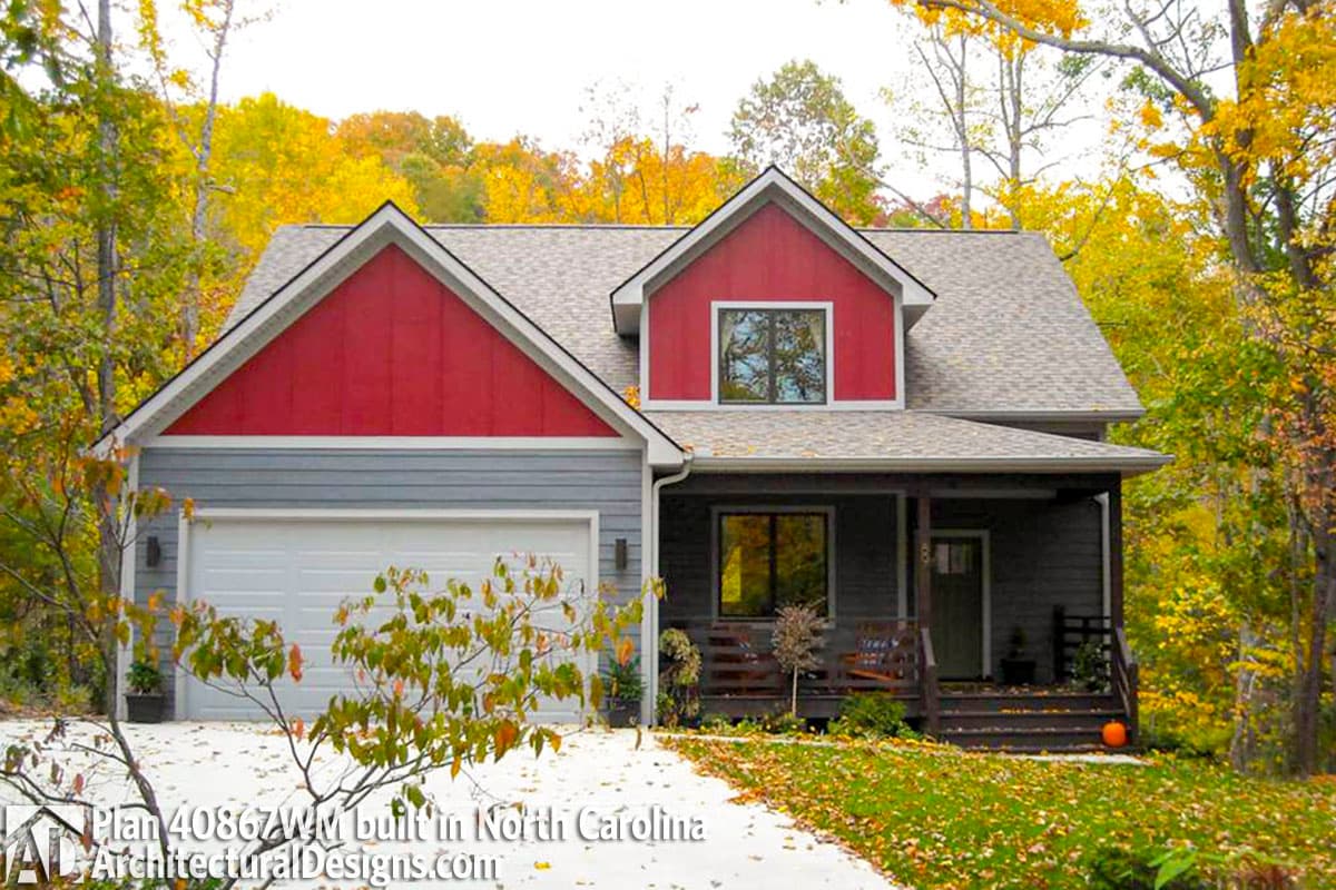 House plan exterior: Two-story home with front-facing garage, prominent gables, and covered porch.