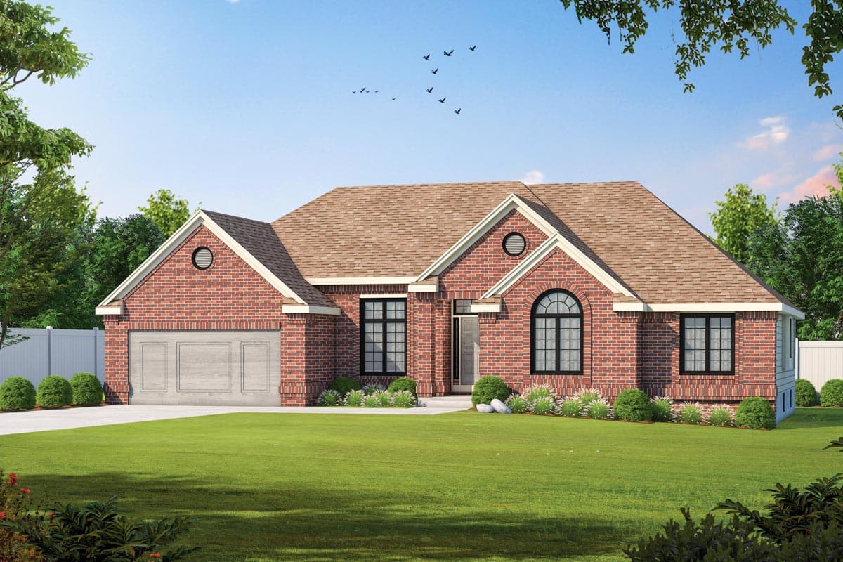 House plan exterior. Ranch style with a brick facade, gabled roof, and attached garage. Includes arched window detail and round attic vent.