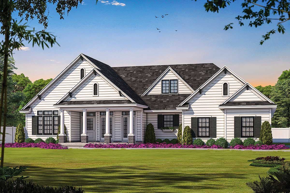 House plan exterior featuring a wide front porch with columns, multiple gables, and arched dormer windows.
