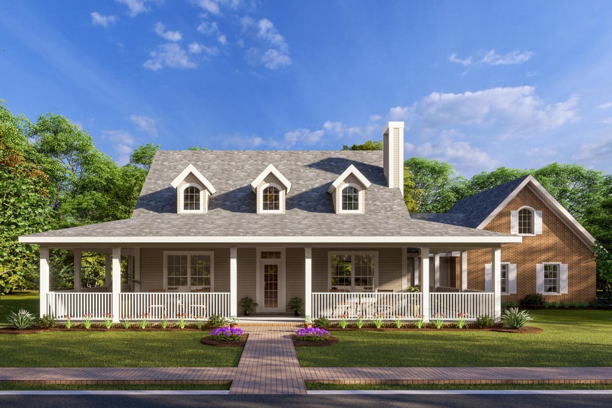 House plan exterior. Two-story farmhouse with a wraparound porch, three dormers, and a gabled roof. A brick facade is attached on the side.