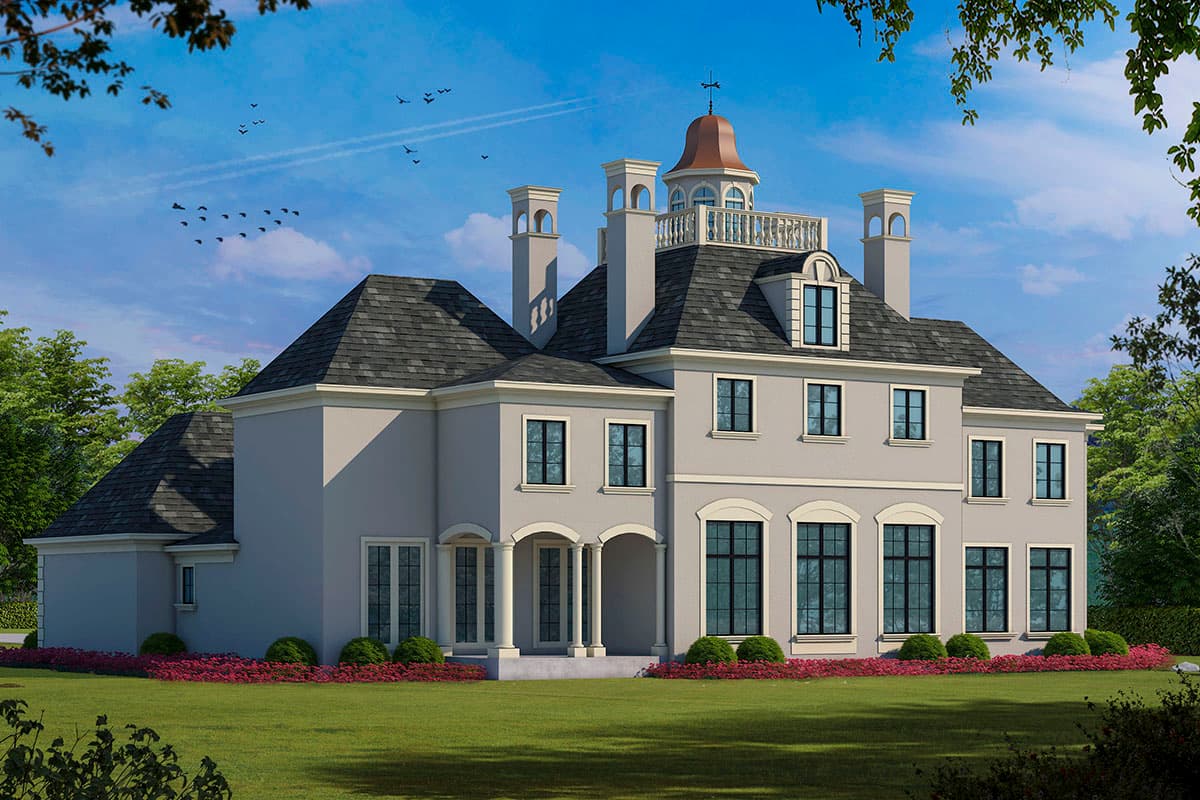 House plan exterior: three-story French-inspired home with a central cupola, multiple gables, and arched entryway.