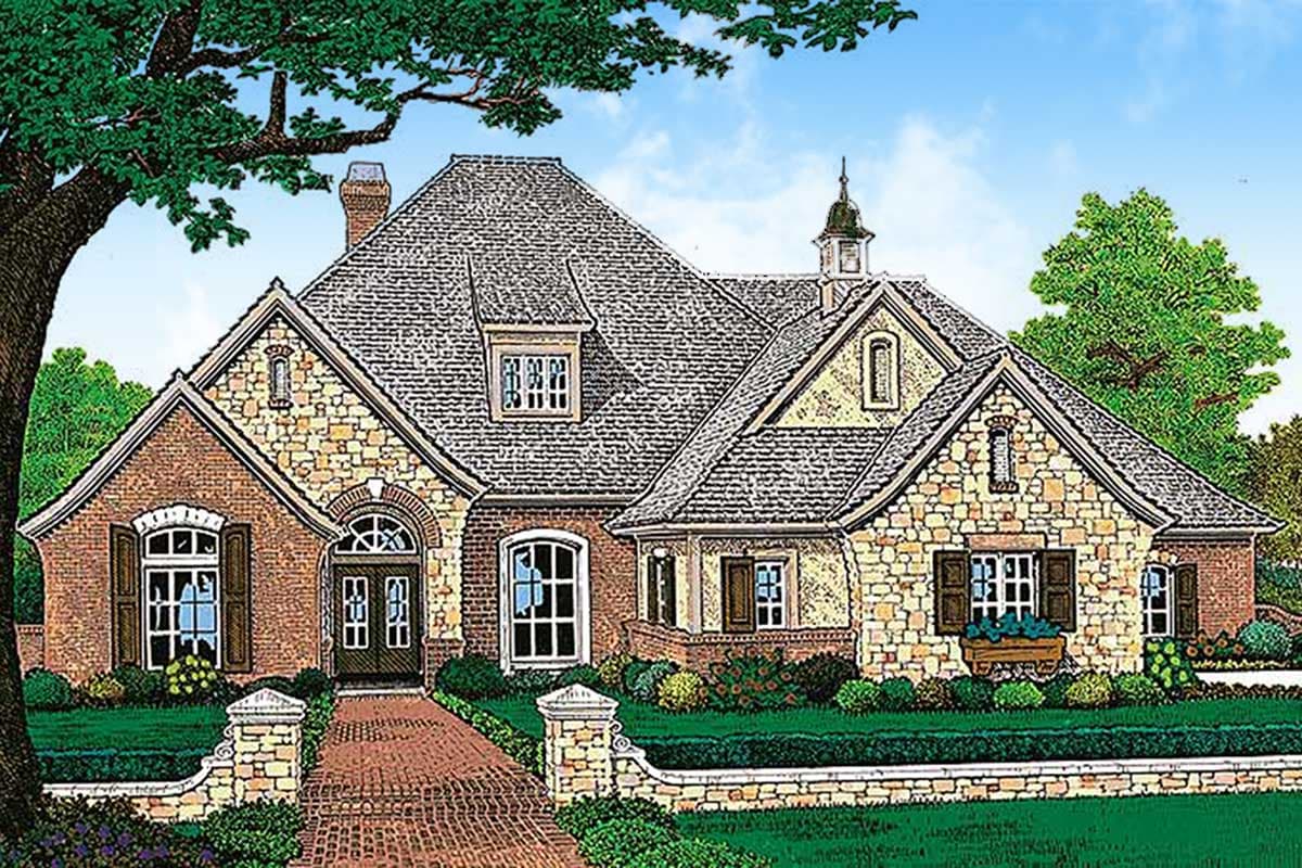 House plan exterior rendering showing a multi-gabled roofline, brick and stone facade, arched entryway, and dormer window.