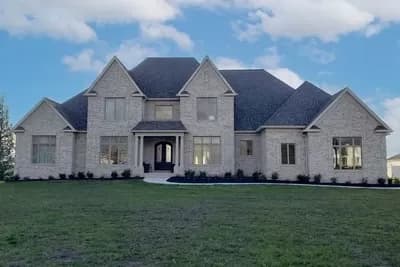 4-Bedroom House Plan with 2-Story Living Room - 4166 Sq Ft