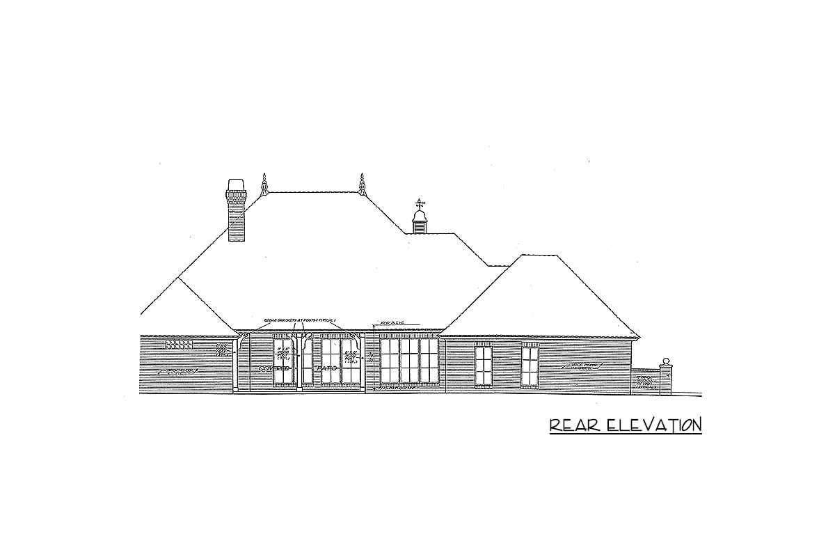 Rear elevation drawing of a house plan, showing a hip roof, chimney, and covered patio with French doors.