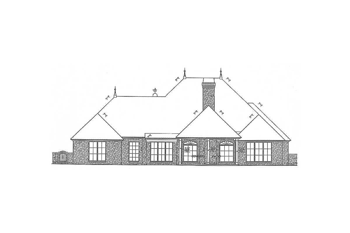 House plan exterior drawing of a single-story home with multi-level rooflines, prominent stone chimney, and arched entry.