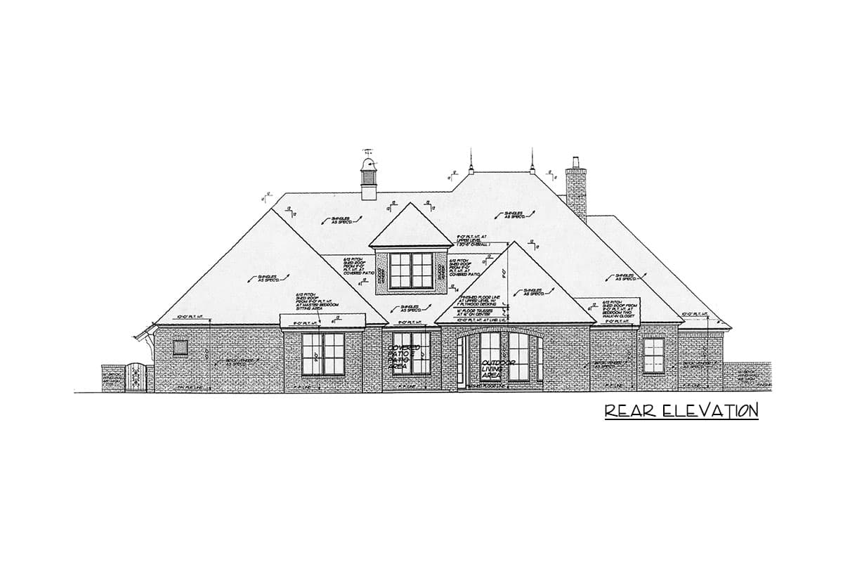 Rear elevation house plan with brick facade, gabled rooflines, dormer window, covered patio, and outdoor living area.