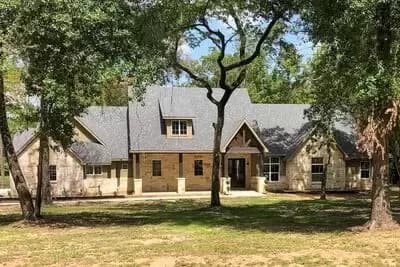 Hill Country House Plan with 3 Beds and a 4-Car Garage