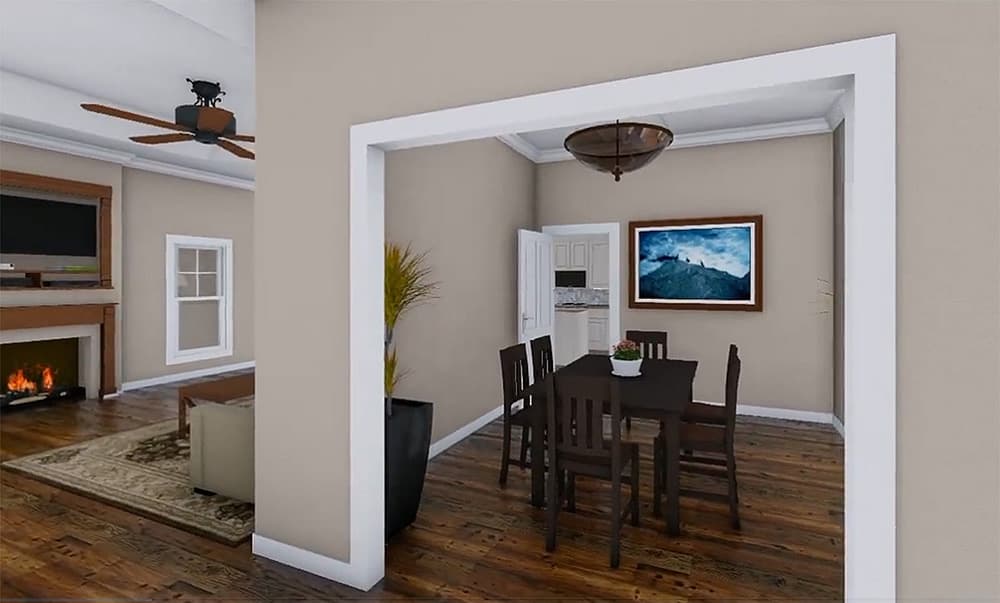 Interior view showing living room with fireplace and dining room with table set for four.