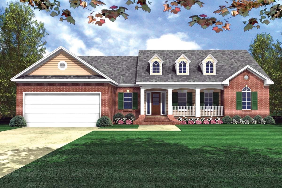House plan exterior: One-story brick home with a front-entry garage, covered front porch with white railings, and three dormer windows.