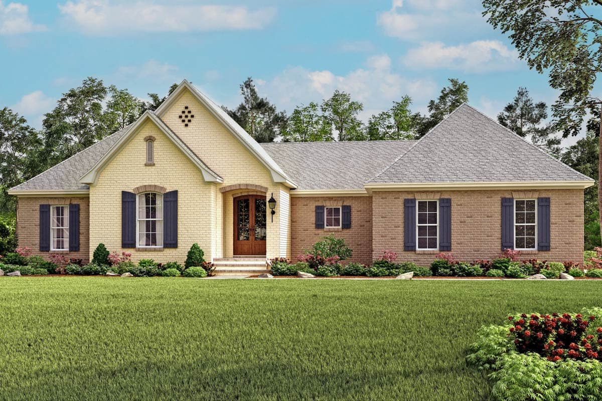 House plan exterior: Single-story home with brick facade, prominent gables, dormer, and arched entry with double doors.