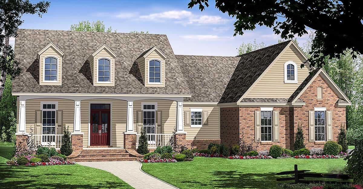 House plan exterior: Two-story home with a covered front porch, dormer windows, brick accents, and arched gables.