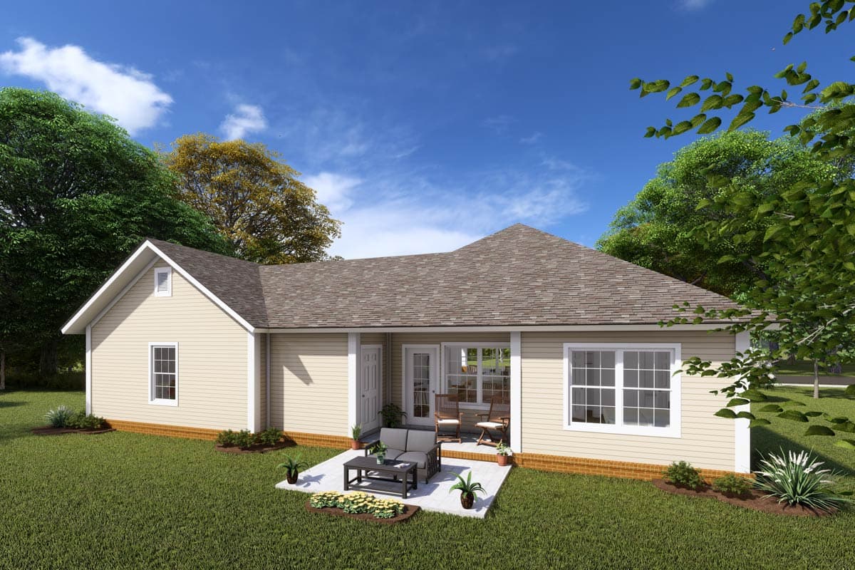 House plan exterior, single-story, tan siding, gable roof, and rear patio with seating.
