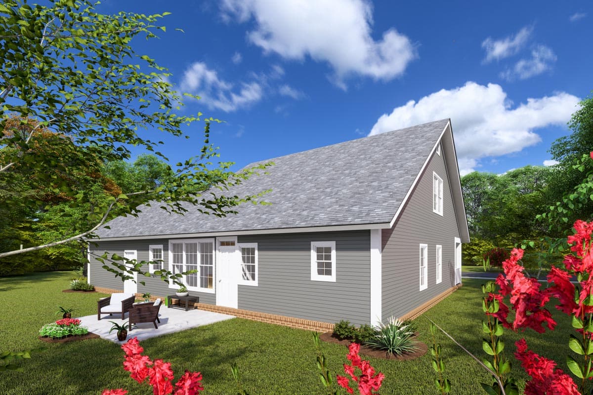 House plan exterior: one-story home with vinyl siding, gabled roof, and patio with seating.