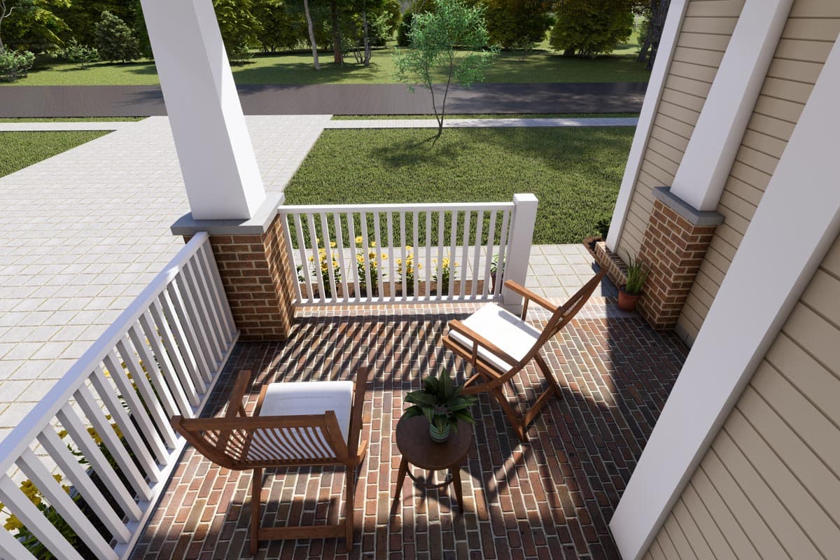 House plan exterior featuring a brick and siding facade, white railing, and covered porch with seating.