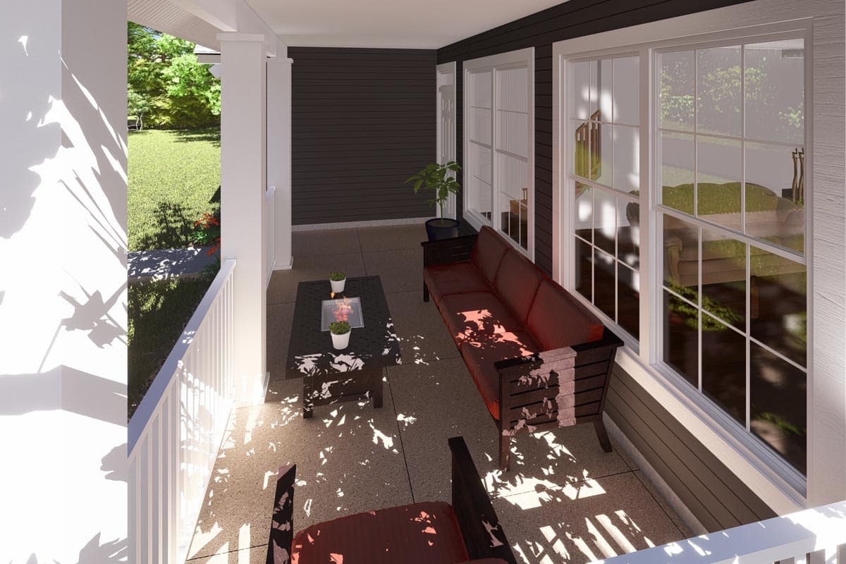 Covered porch with seating and a fire pit table, featuring large multi-pane windows and dark horizontal siding.