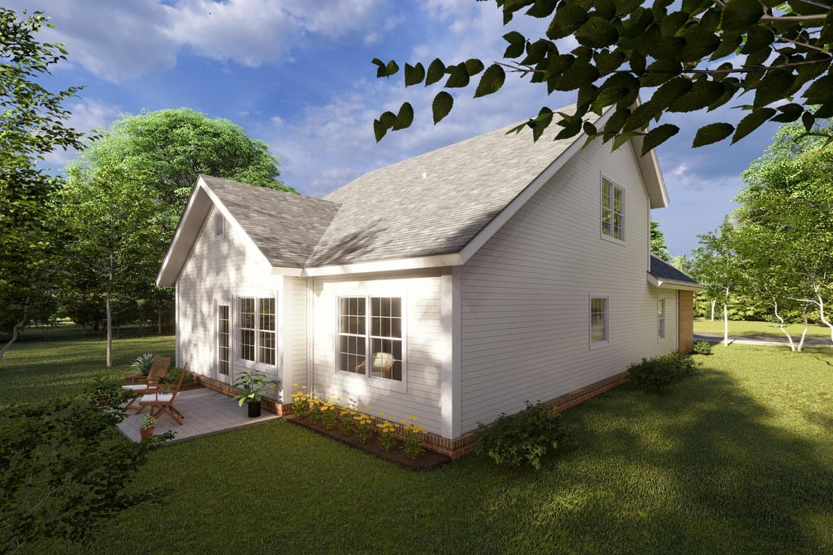House plan exterior: Two-story dwelling with a gable roof, white siding, and a brick foundation. Features double doors and large windows.