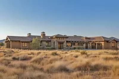 Striking Tuscan Home with Vaulted Great Room