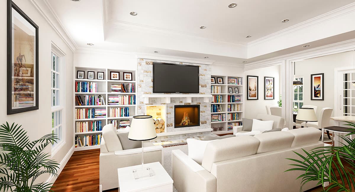 Living room with built-in bookshelves flanking a fireplace with a television above.
