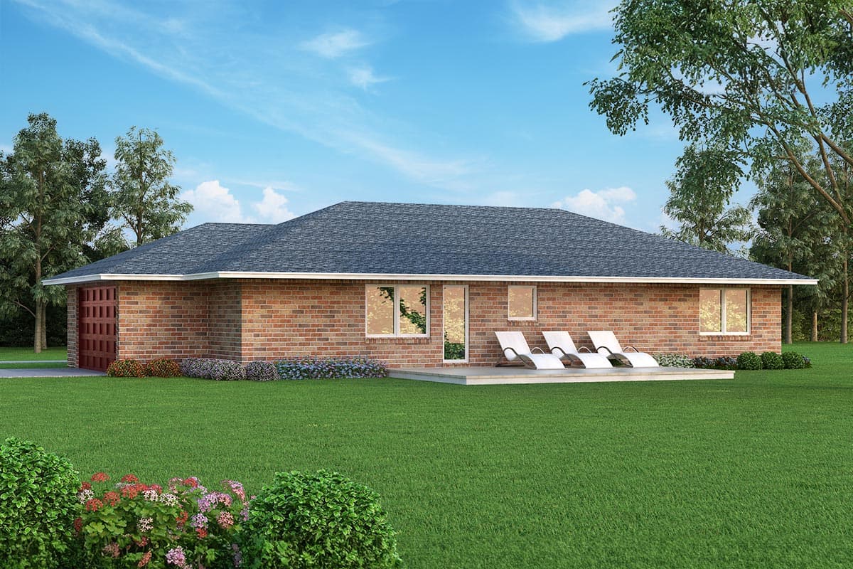 House plan exterior, single-story brick home with attached side-entry garage, low-slope hip roof, and rear patio with lounge chairs.