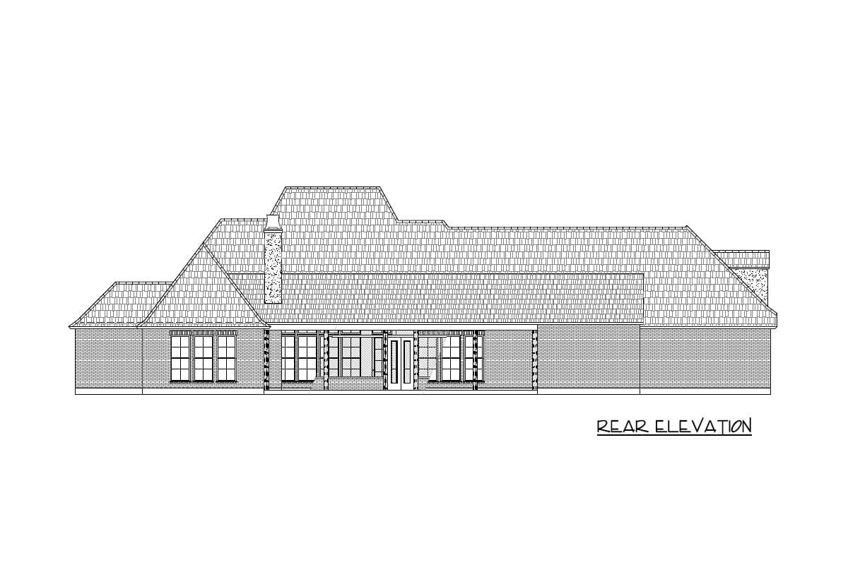 Rear elevation drawing of a house plan showing brick exterior, multiple gables, a prominent chimney, and various window arrangements.