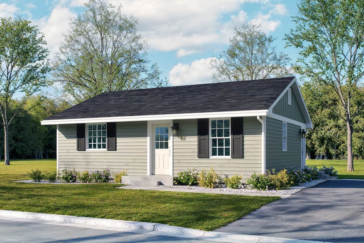 One-story house plan exterior with gable end, white-trimmed windows with black shutters, and a centered front door with a porch light.