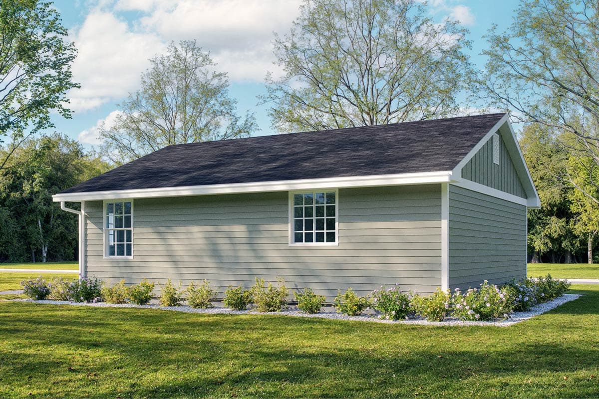 House plan exterior view of a single-story structure with horizontal siding, a gable end, and two multi-pane windows.