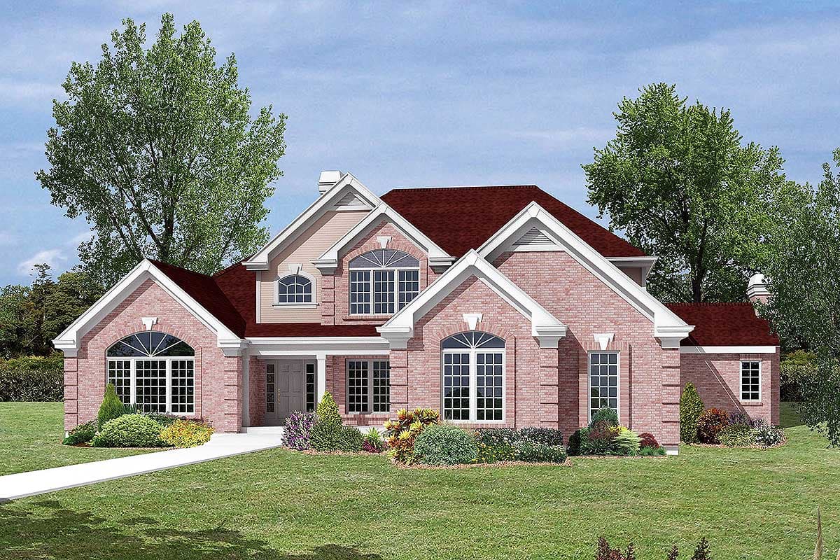 House plan exterior with brick facade, arched windows, multiple gables, and a covered entry.