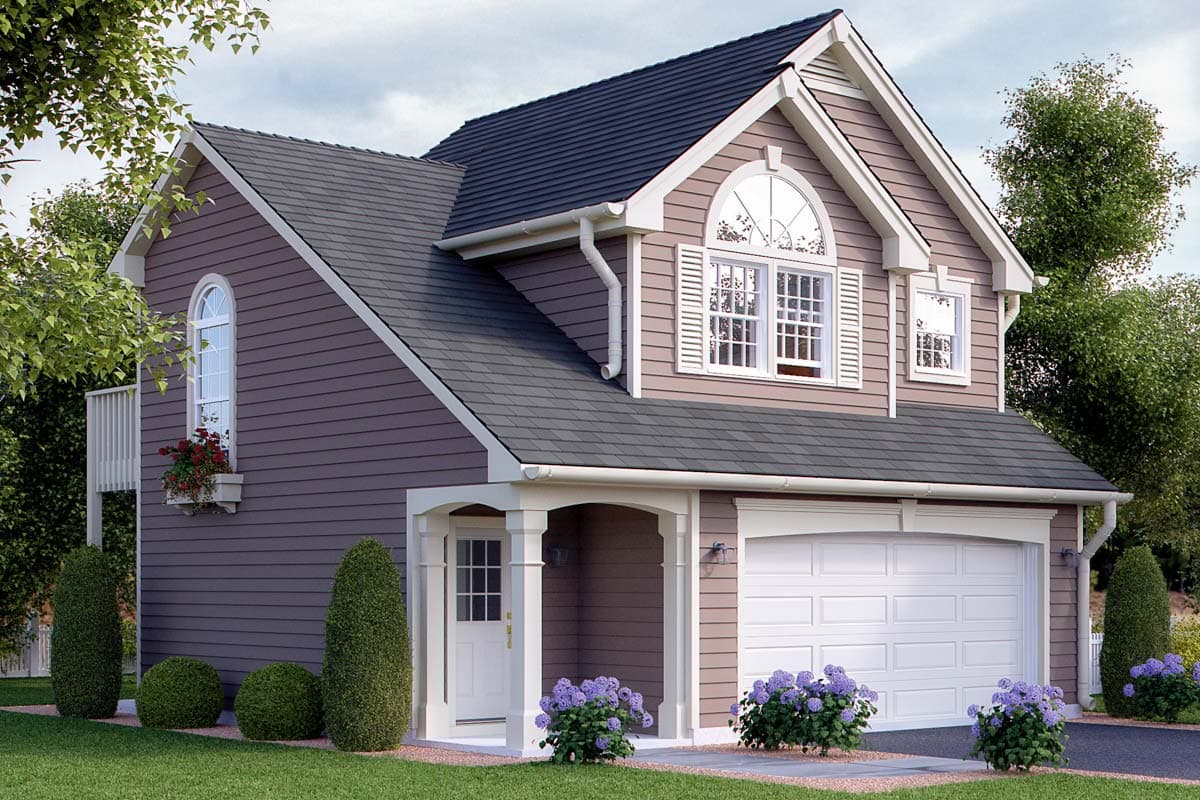 House plan exterior: Two-story home with vinyl siding, arched windows, covered entryway, and two-car garage.