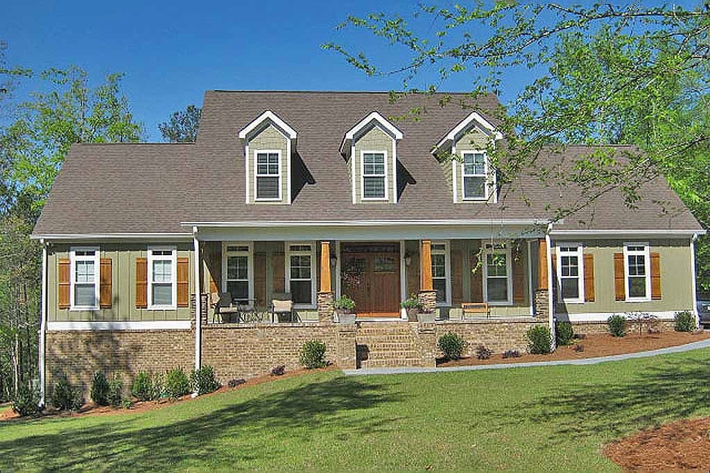House plan exterior: Two-story Modern Farmhouse with covered front porch, three gables, brick base, and stone-accented columns.