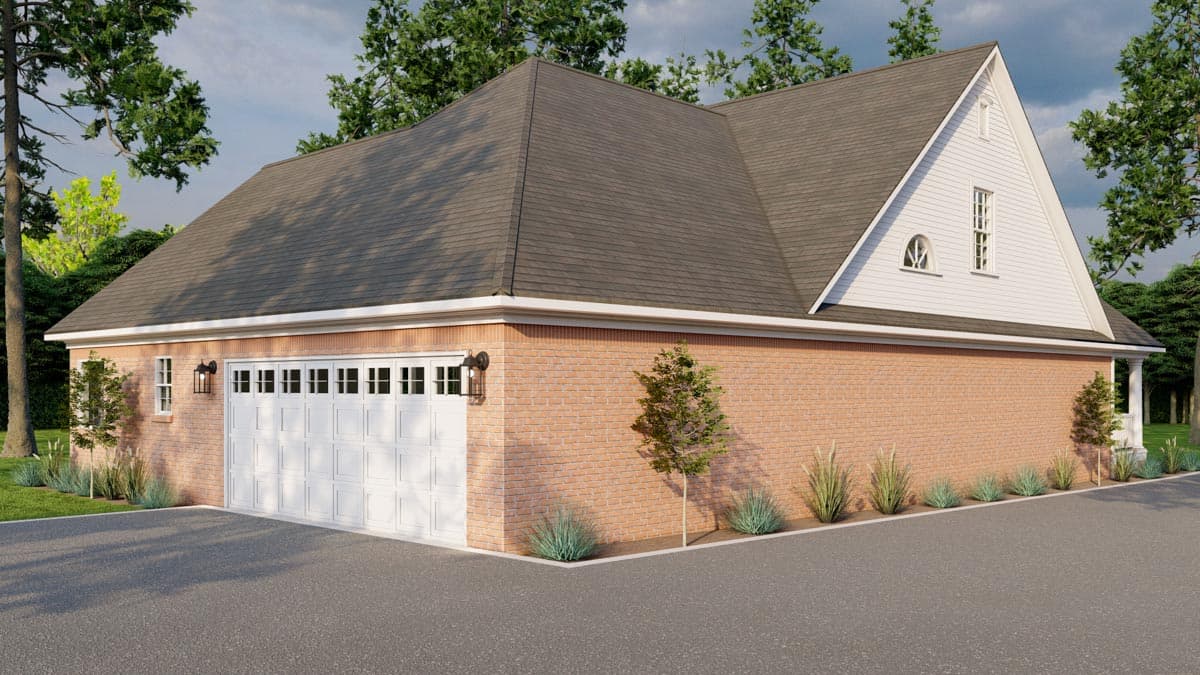 House plan exterior: Two-story brick garage with a gable dormer, white garage door, and asphalt driveway.