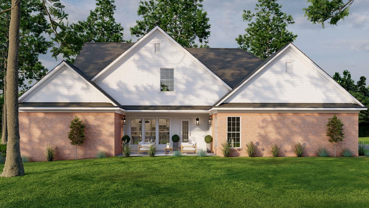 House plan exterior: Ranch style, brick and vinyl siding, multiple gables, covered patio with glass doors.
